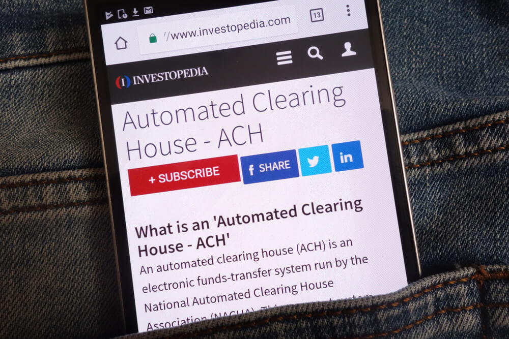 Automated Clearing House - ACH Written on the Mobile Phone Screen